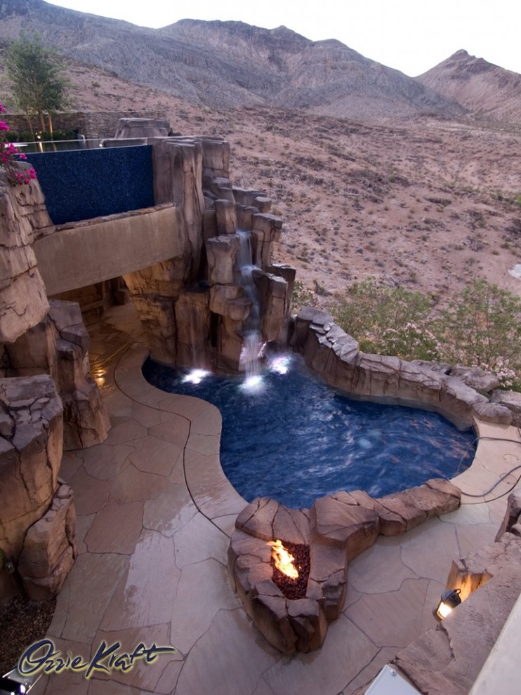 Inspiration for a contemporary backyard custom-shaped pool in Las Vegas.