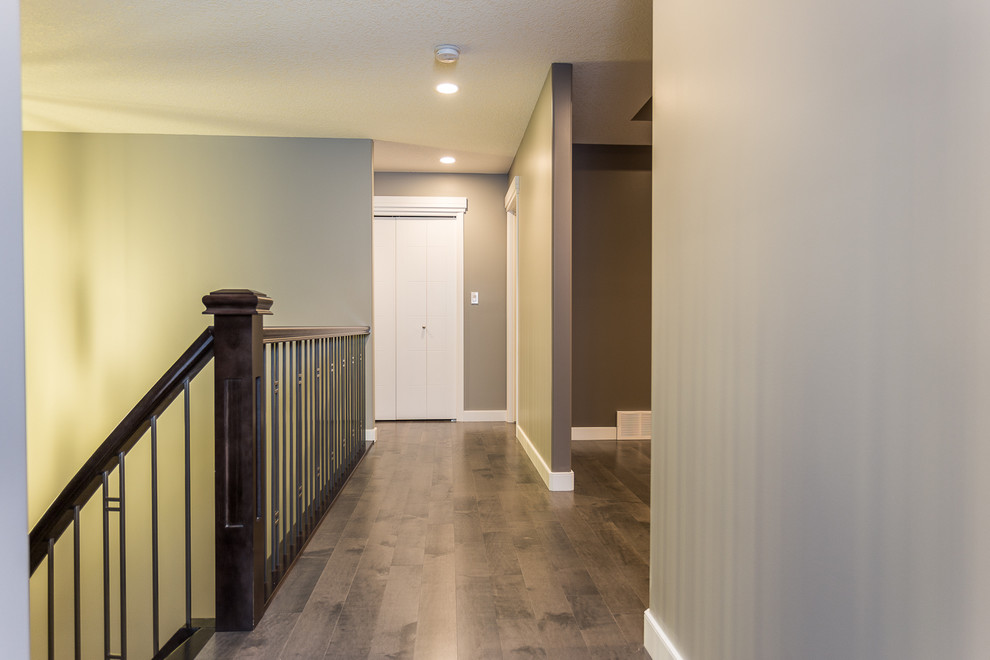 Transitional home design photo in Edmonton