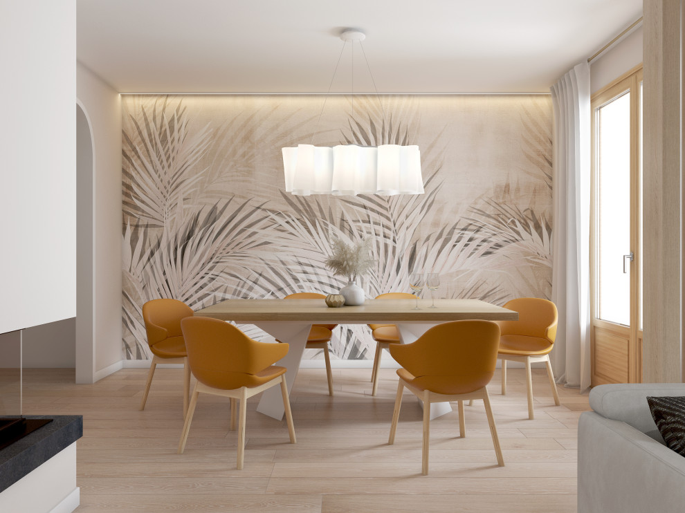 Idée de décoration pour une salle à manger ouverte sur le salon nordique de taille moyenne avec un mur blanc, parquet clair, une cheminée d'angle, un manteau de cheminée en plâtre, un sol beige et du papier peint.