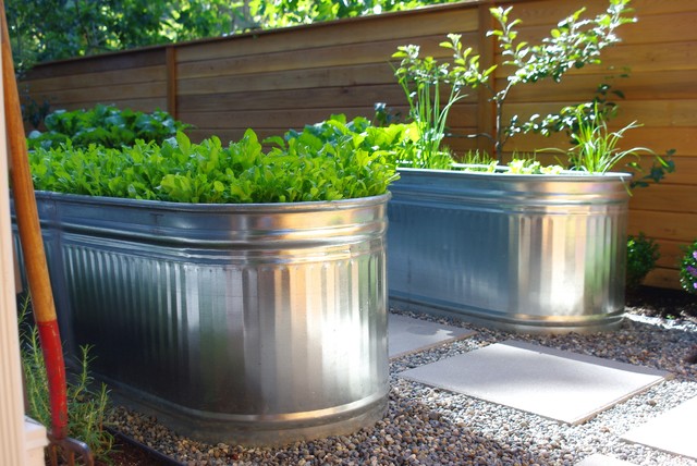 I made six galvanized trough planters that have held up for years