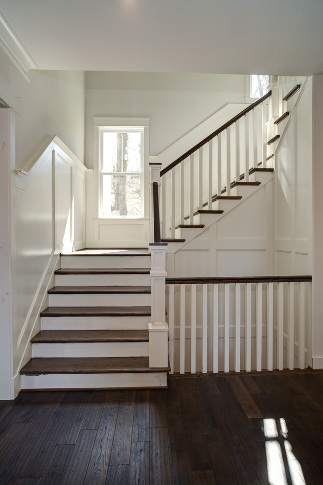 Inspiration for a mid-sized arts and crafts wood u-shaped staircase in DC Metro with wood railing.