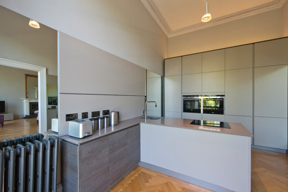 Inspiration for a large contemporary kitchen in Edinburgh.