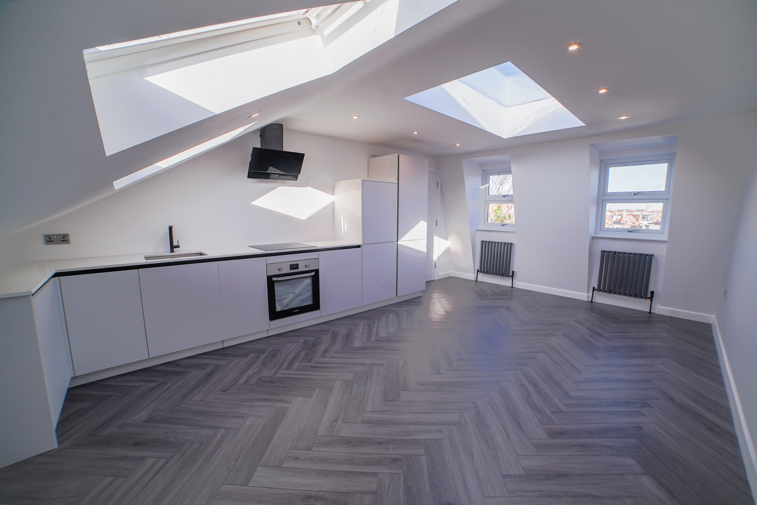 Penthouse kitchen and bedroom