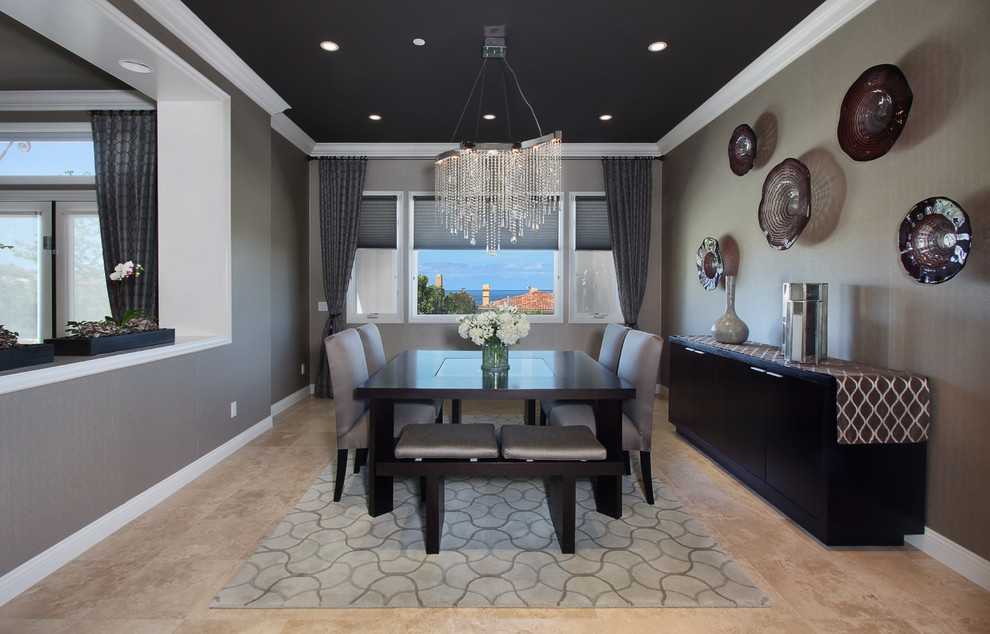 This is an example of a mid-sized contemporary open plan dining in Orange County with brown walls, porcelain floors, no fireplace and beige floor.