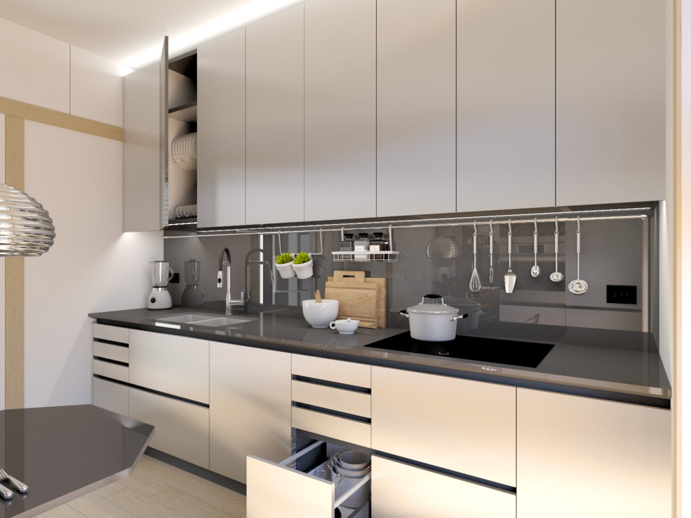 Photo of a small modern single-wall separate kitchen in Other with an undermount sink, flat-panel cabinets, stainless steel cabinets, quartz benchtops, black splashback, stainless steel appliances, porcelain floors, a peninsula, brown floor and black benchtop.