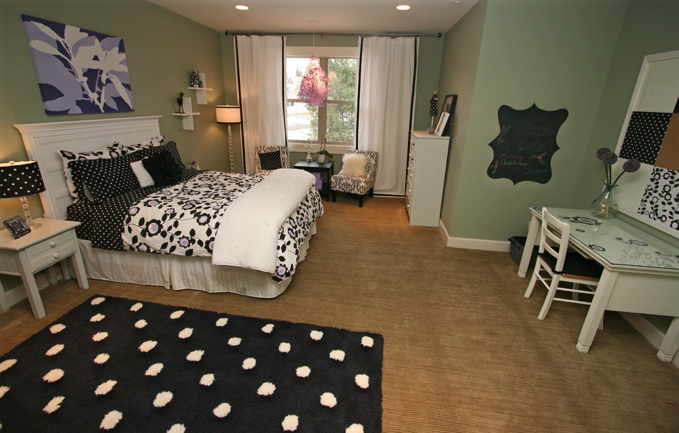 Large contemporary kids' room in Seattle with green walls and carpet for girls.