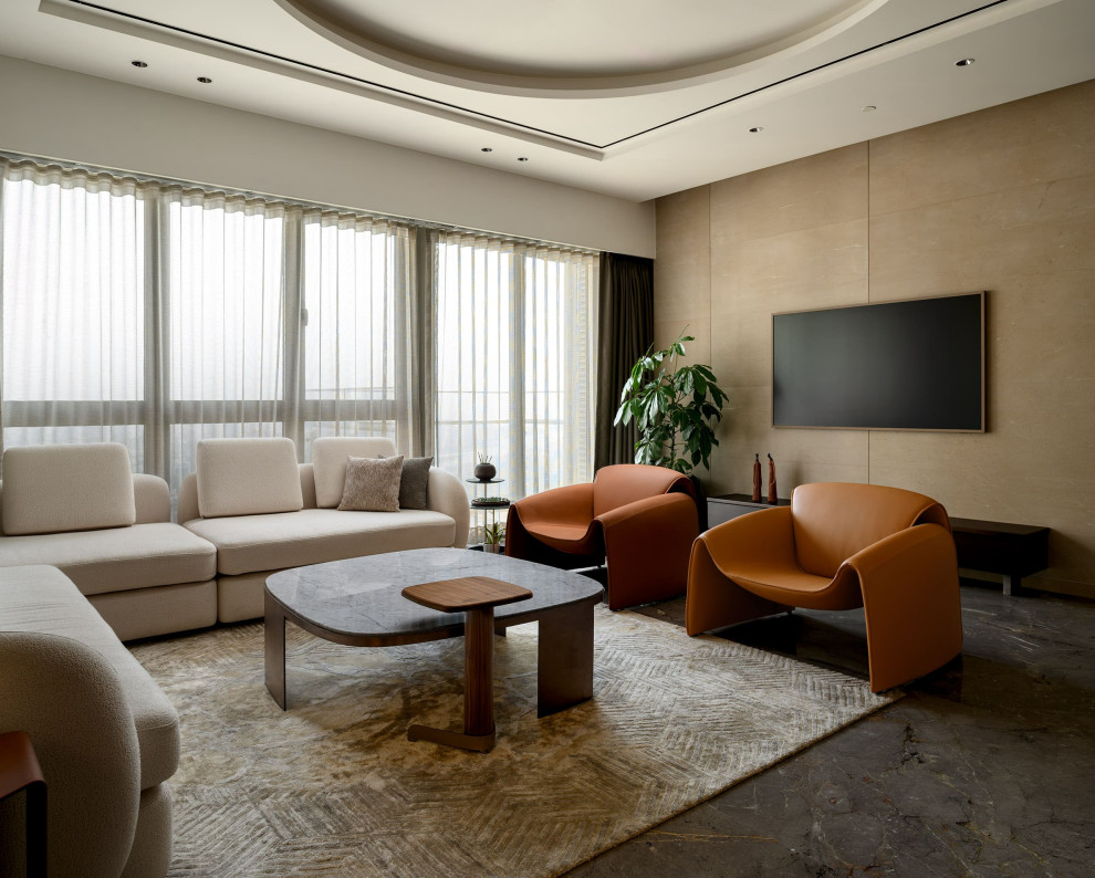Inspiration for a contemporary Open Concept living room With Beige Walls and a Wall-mounted TV.