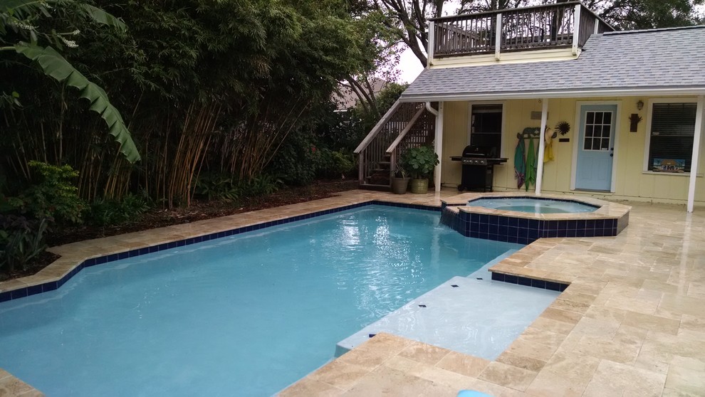 This is an example of a mid-sized contemporary pool in Jacksonville.