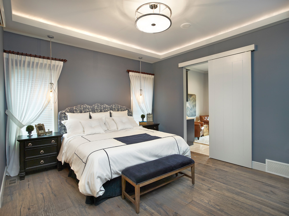Design ideas for a transitional bedroom in Edmonton.
