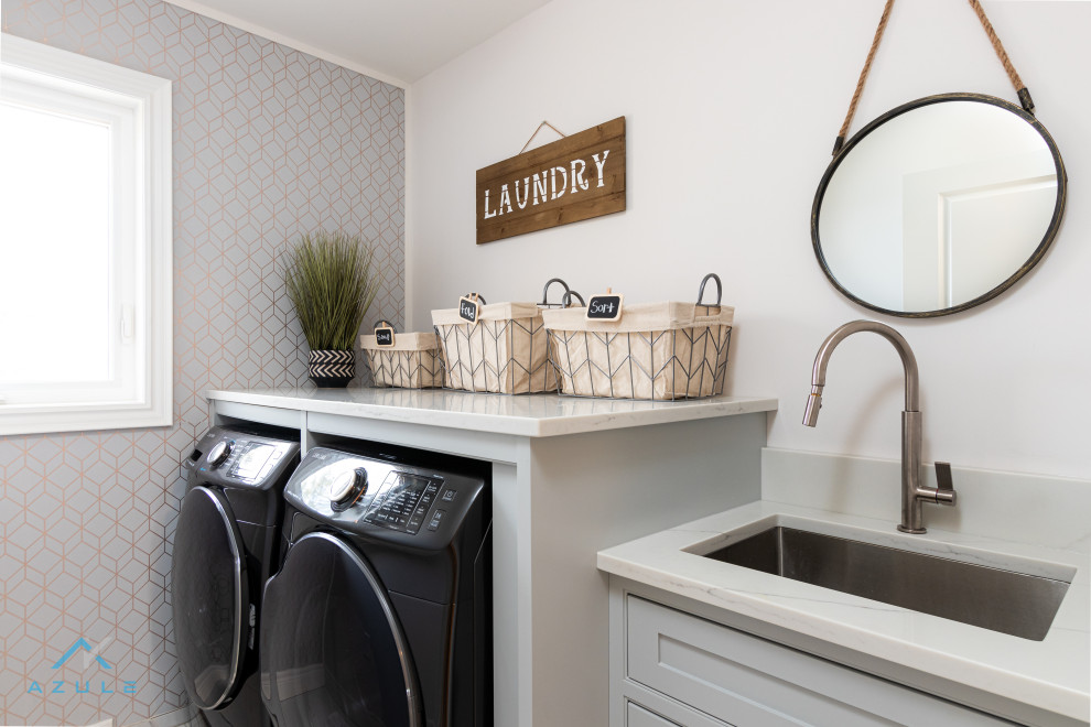 Mid-sized country single-wall dedicated laundry room in Other with a farmhouse sink, beaded inset cabinets, turquoise cabinets, quartz benchtops, white walls, ceramic floors, a side-by-side washer and dryer, white floor and white benchtop.