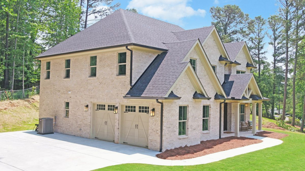 Photo of a transitional two-car garage in Atlanta.