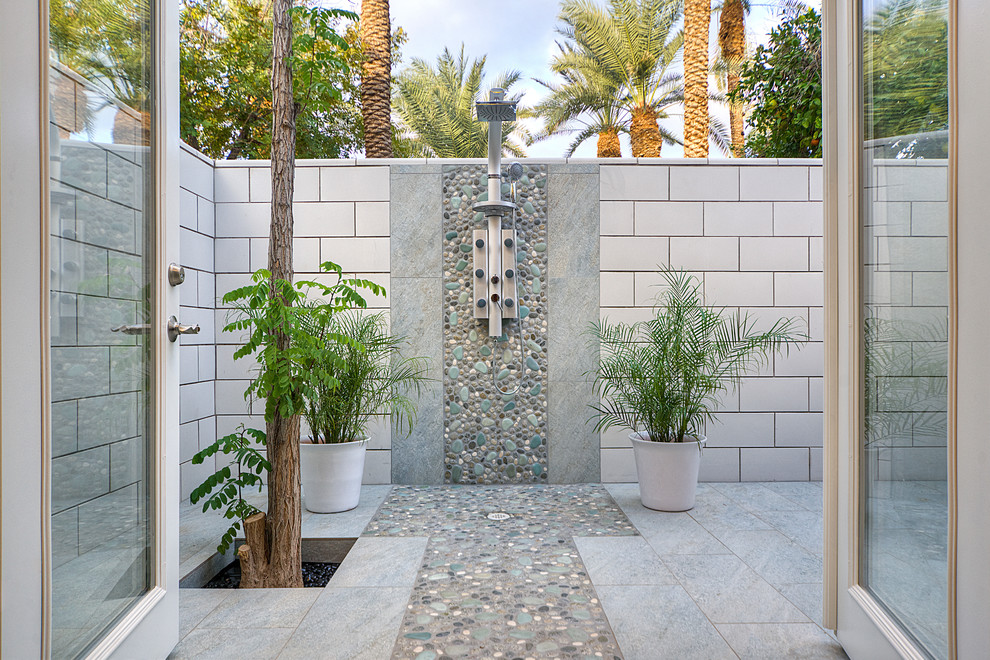 Design ideas for a contemporary patio in Phoenix with an outdoor shower.