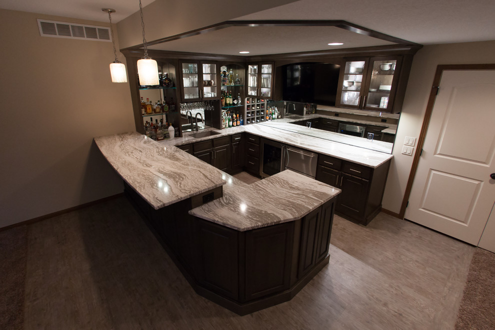 Design ideas for a large transitional u-shaped wet bar in Other with an undermount sink, glass-front cabinets, dark wood cabinets, quartz benchtops, multi-coloured splashback, mirror splashback, vinyl floors and grey floor.