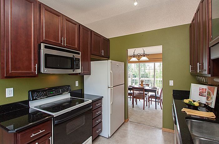 Example of a transitional home design design in Cedar Rapids