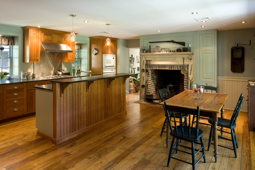 Traditional kitchen/dining combo in Philadelphia with medium hardwood floors.