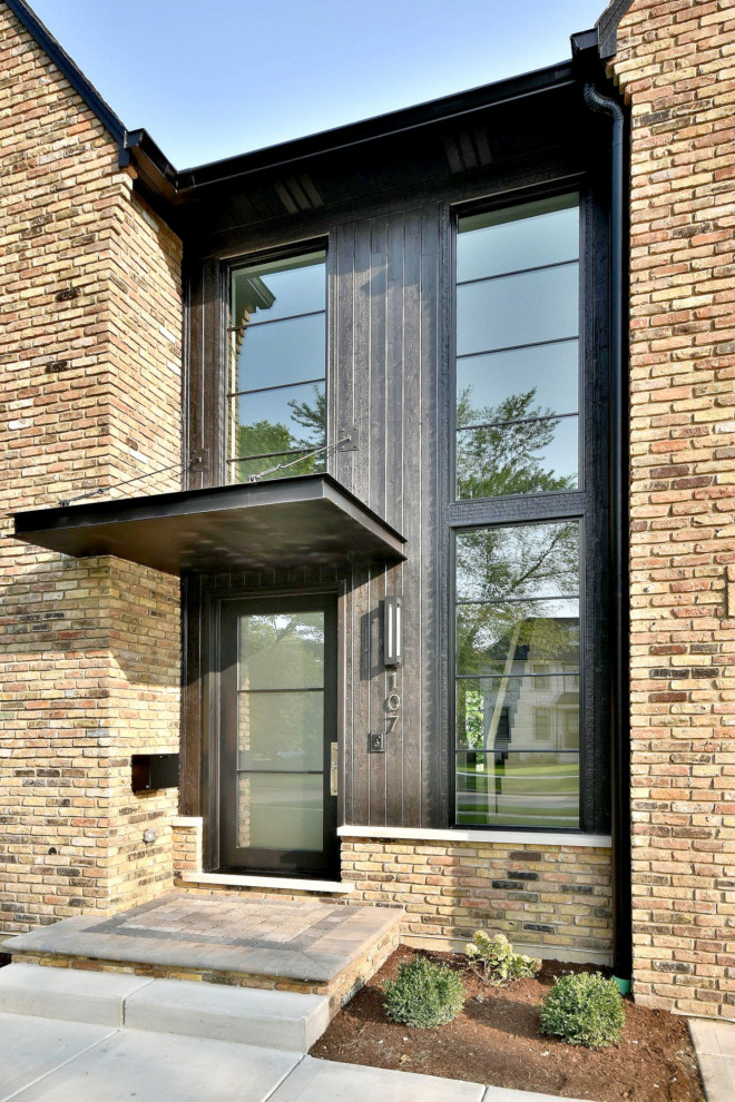 Example of a transitional exterior home design in Chicago