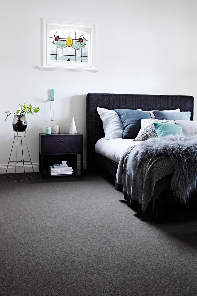 Design ideas for a mid-sized contemporary master bedroom in Melbourne with white walls and carpet.
