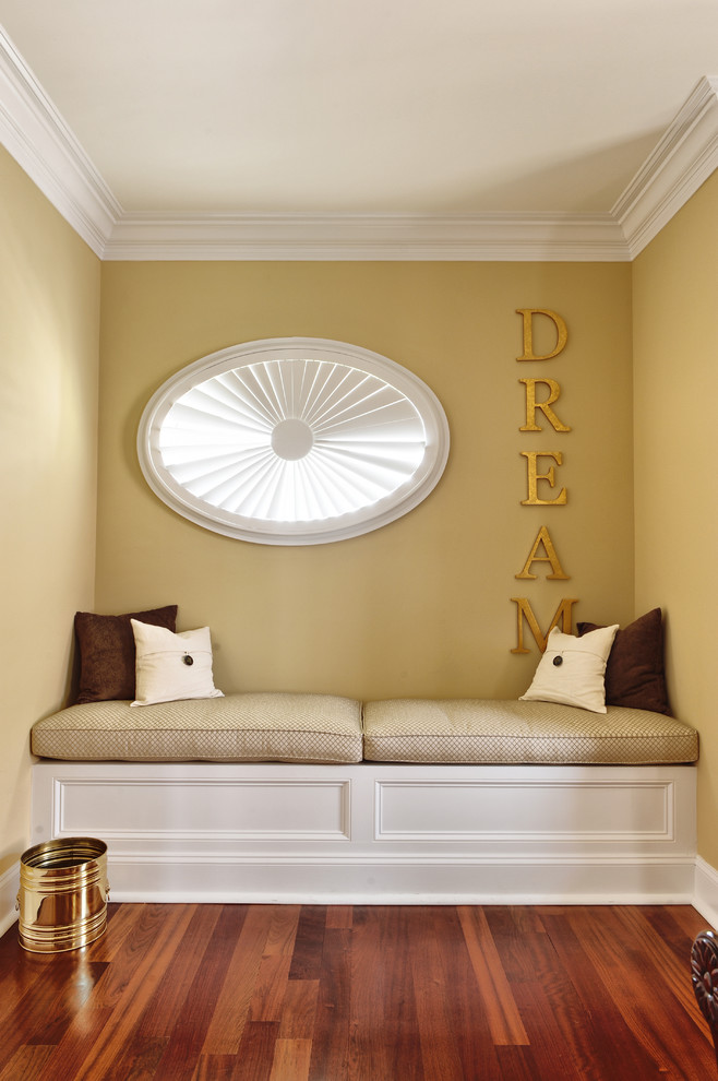 Photo of a contemporary bedroom in Philadelphia with beige walls and dark hardwood floors.