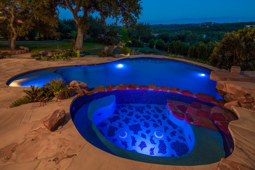 Mountain style pool photo in Austin