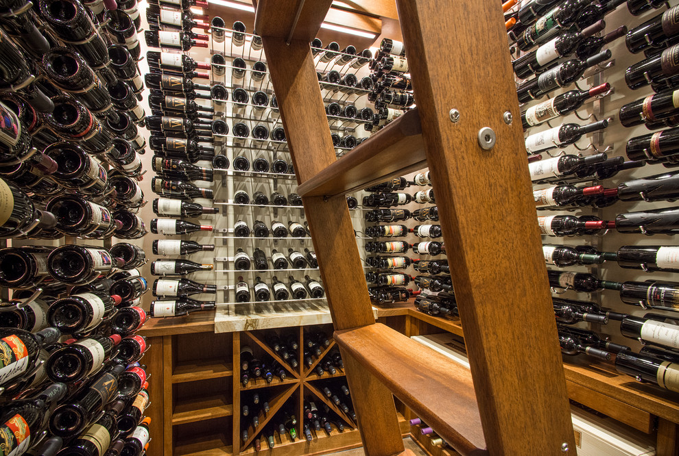 Design ideas for a large transitional wine cellar in Dallas with concrete floors and storage racks.