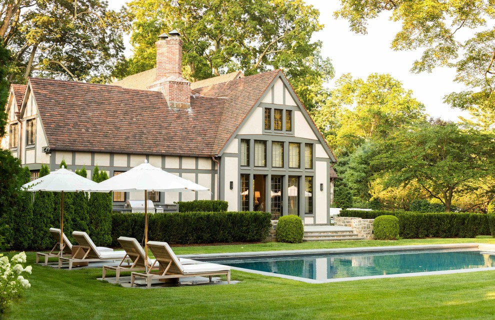 Inspiration for a traditional backyard rectangular lap pool in New York.