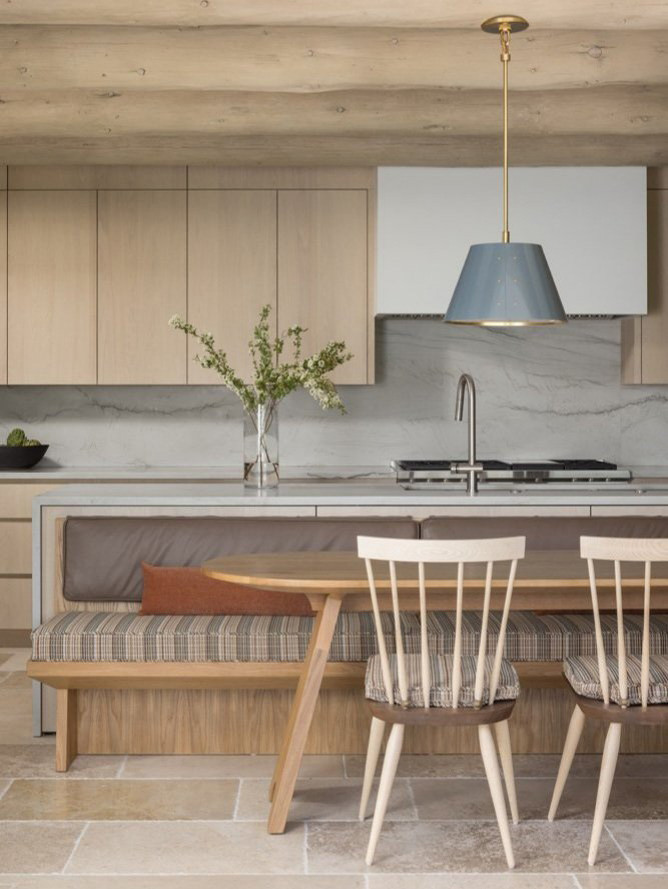 Inspiration for a rustic single-wall travertine floor, beige floor and wood ceiling open concept kitchen remodel with flat-panel cabinets, light wood cabinets, multicolored backsplash, marble backsplash, an island and white countertops