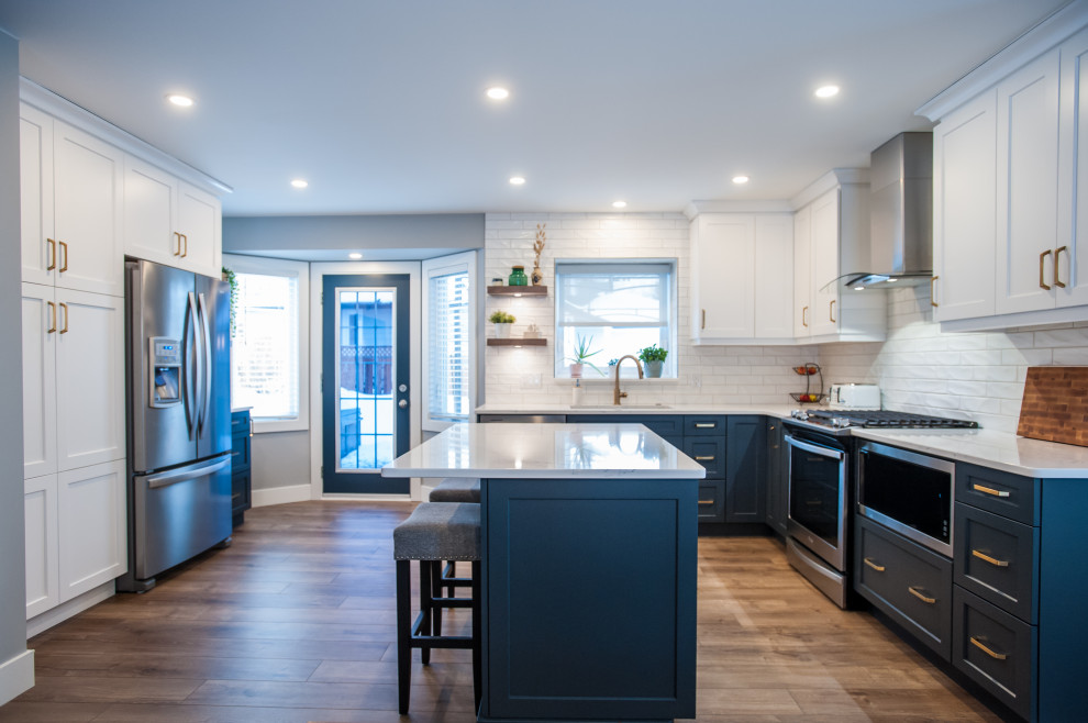 Example of a transitional kitchen design in Edmonton