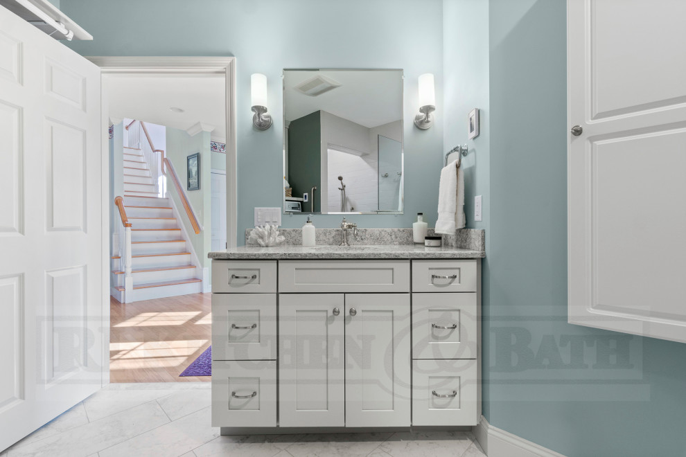 Inspiration for a large transitional bathroom in Providence with shaker cabinets, grey cabinets, a curbless shower, porcelain tile, porcelain floors, an undermount sink, engineered quartz benchtops, an open shower, a laundry, a single vanity and a built-in vanity.