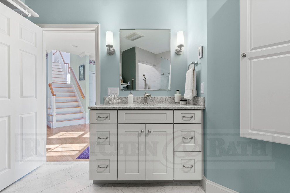 Walk-in shower - large transitional porcelain tile porcelain tile and single-sink walk-in shower idea in Providence with shaker cabinets, gray cabinets, an undermount sink, quartz countertops and a built-in vanity