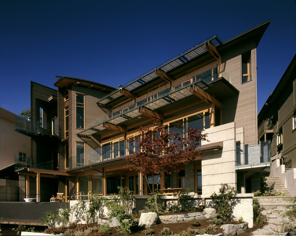Design ideas for a contemporary exterior in Vancouver with wood siding.