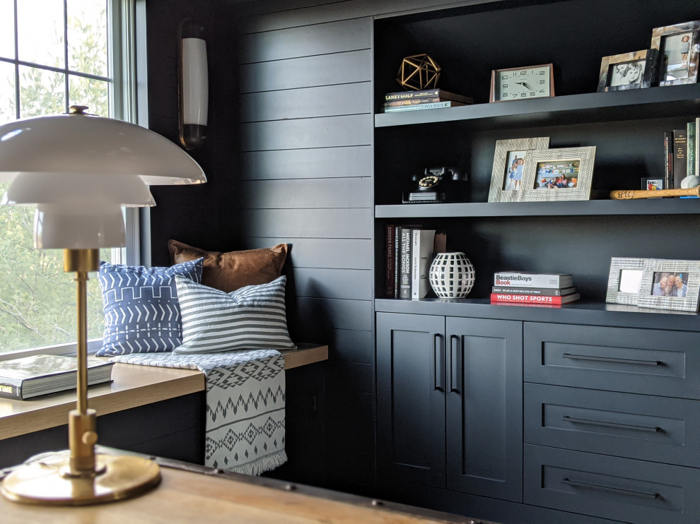 Design ideas for a transitional home office in Other with blue walls, light hardwood floors, a freestanding desk, beige floor and planked wall panelling.