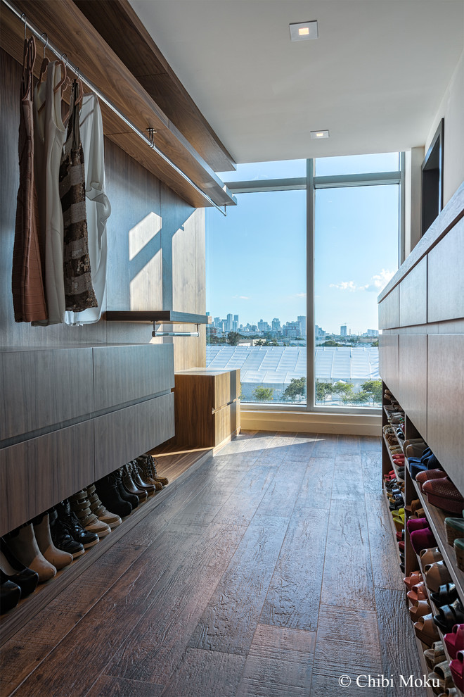 Eclectic storage and wardrobe in Miami.
