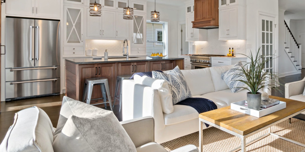 Example of a transitional u-shaped eat-in kitchen design with an island