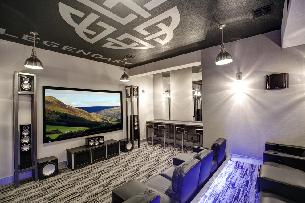 Design ideas for an industrial home theatre in Kansas City with carpet.