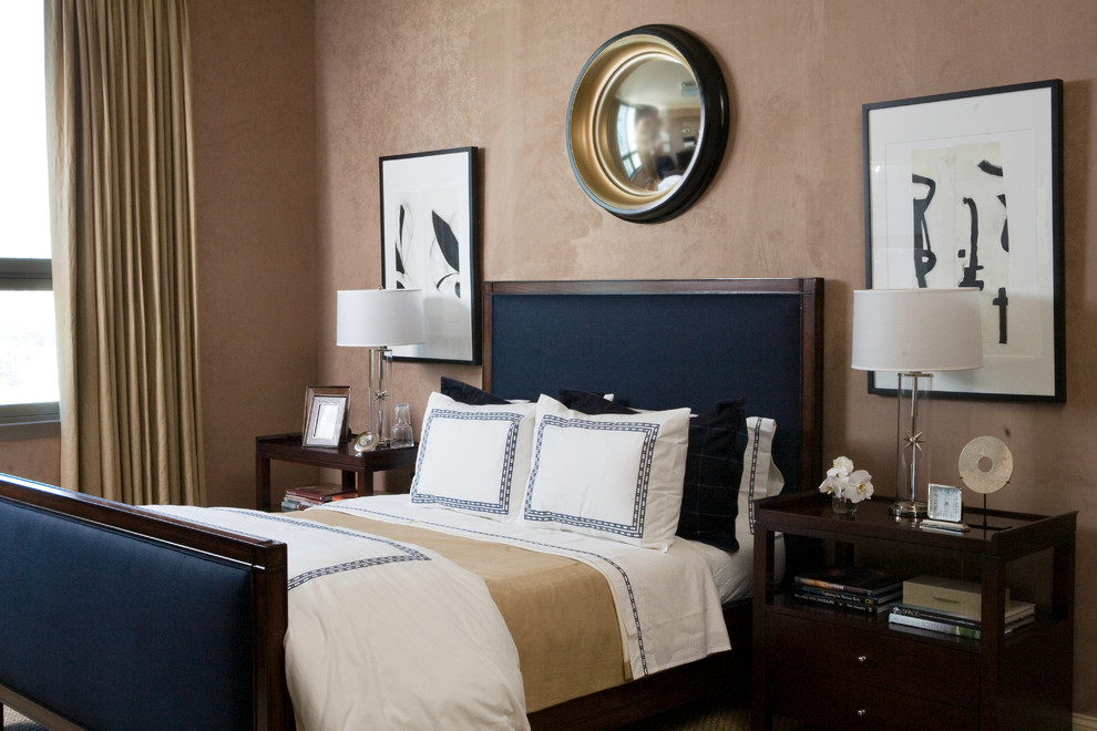 Inspiration for a transitional bedroom in Atlanta with beige walls.