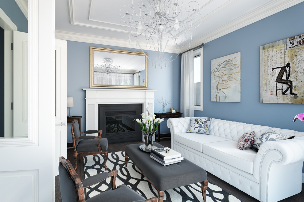 Inspiration for a large traditional enclosed living room in Melbourne with blue walls, medium hardwood floors, a wood fireplace surround, no tv and a standard fireplace.