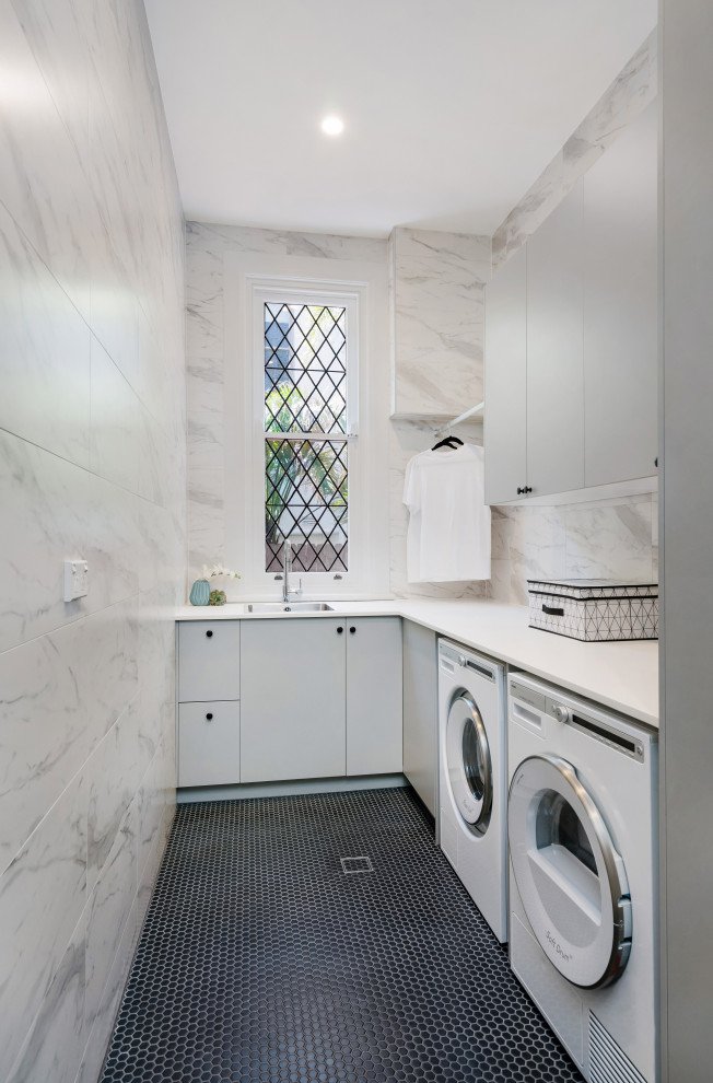 Inspiration for a transitional laundry room in Sydney.