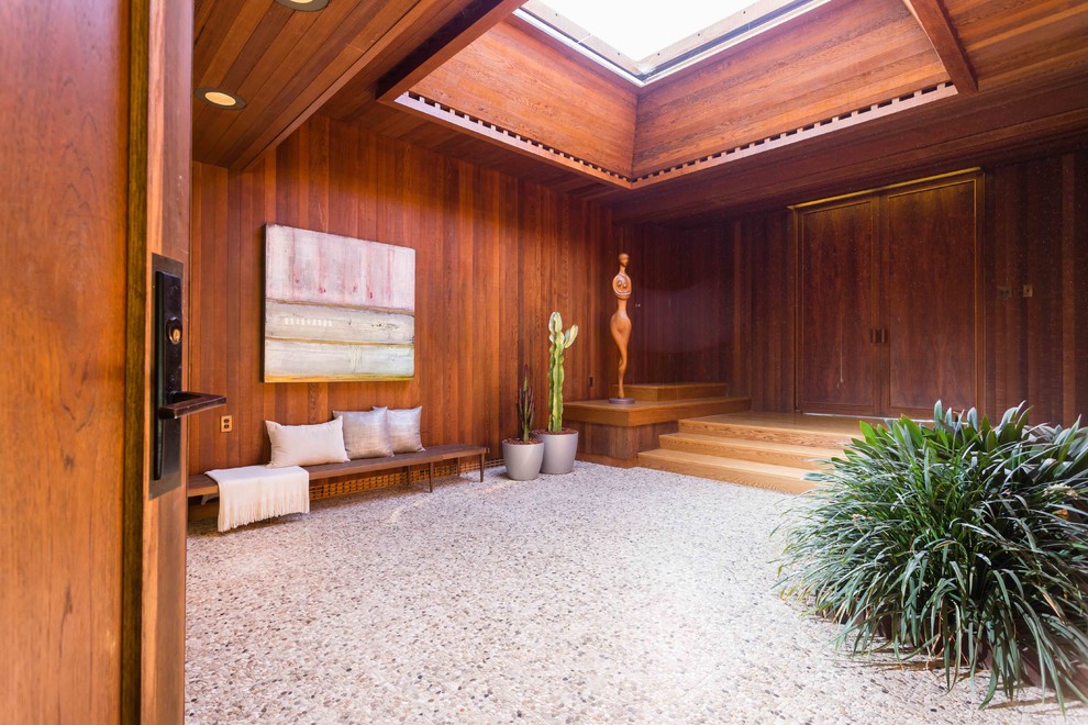 This is an example of a large midcentury foyer in San Francisco.