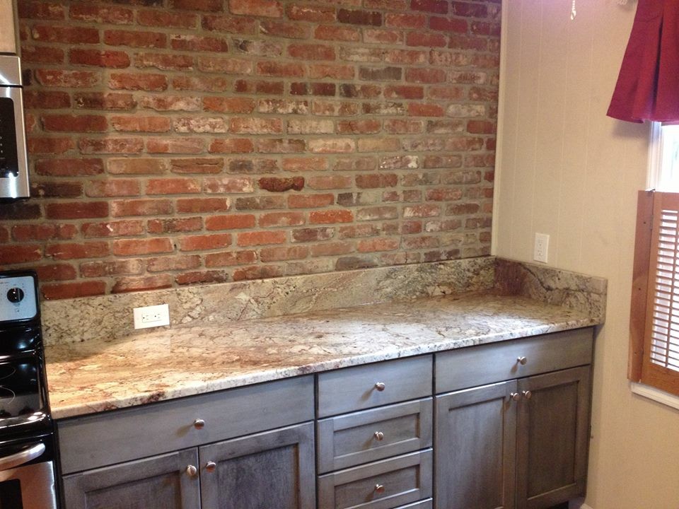 Mid-sized kitchen photo in DC Metro with distressed cabinets and stainless steel appliances