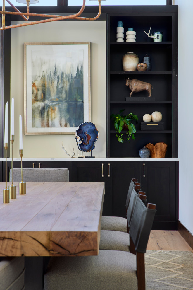 Example of a mountain style dining room design in Denver