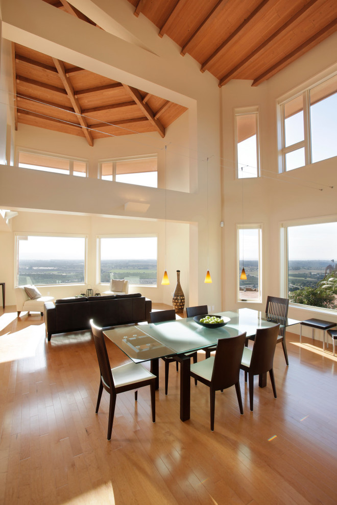 This is an example of a modern dining room in San Luis Obispo with white walls.
