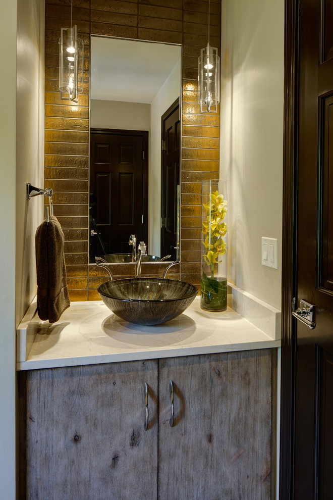 Inspiration for a small country 3/4 bathroom in Chicago with flat-panel cabinets, distressed cabinets, an alcove shower, brown tile, porcelain tile, beige walls, a vessel sink, quartzite benchtops and a hinged shower door.