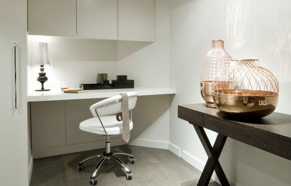 Inspiration for a contemporary home office in Vancouver with medium hardwood floors.
