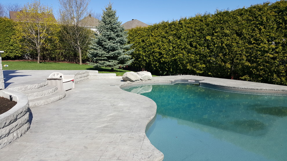 Pool deck with retaining walls & cantilever coping. Ottawa by King