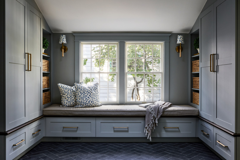 Design ideas for a mid-sized transitional mudroom in DC Metro with blue walls, porcelain floors, a single front door and grey floor.
