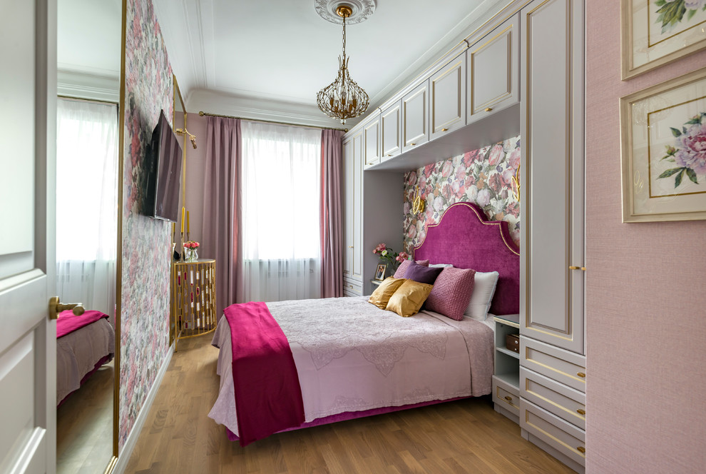 Inspiration for a small transitional master bedroom in Moscow with pink walls, medium hardwood floors and brown floor.