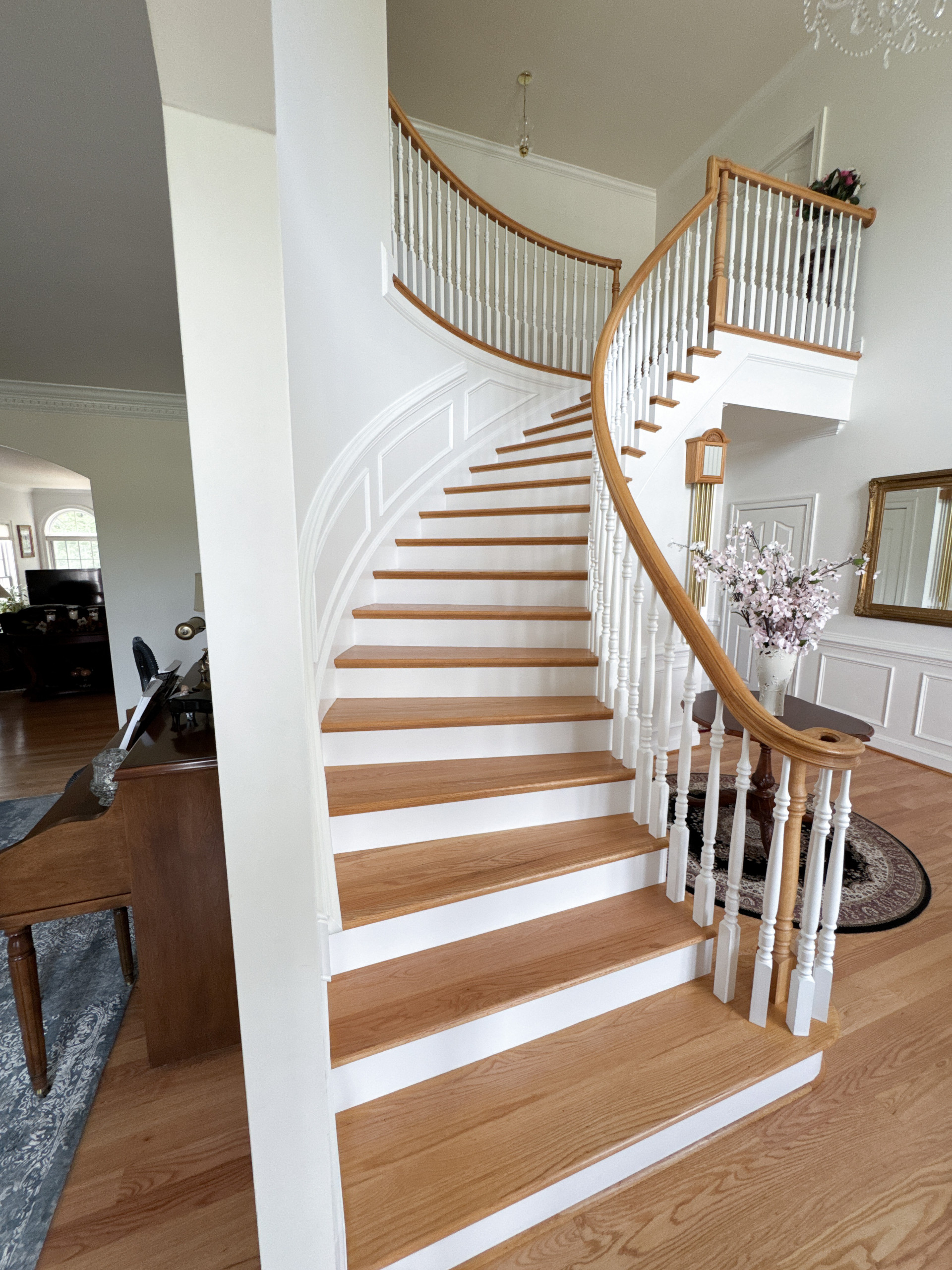 Project #161 | Curved Red Oak Foyer Staircase, 26 Years Later