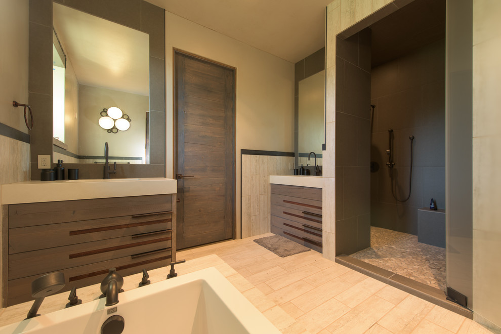 Inspiration for a mid-sized contemporary master wet room bathroom in Sacramento with medium wood cabinets, a freestanding tub, brown tile, porcelain tile, black walls, porcelain floors, an integrated sink, engineered quartz benchtops, beige floor and a hinged shower door.
