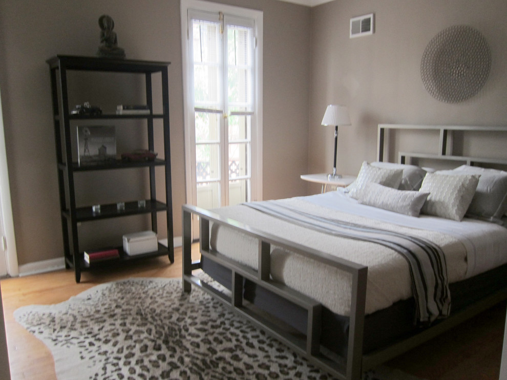 This is an example of a contemporary bedroom in Philadelphia.