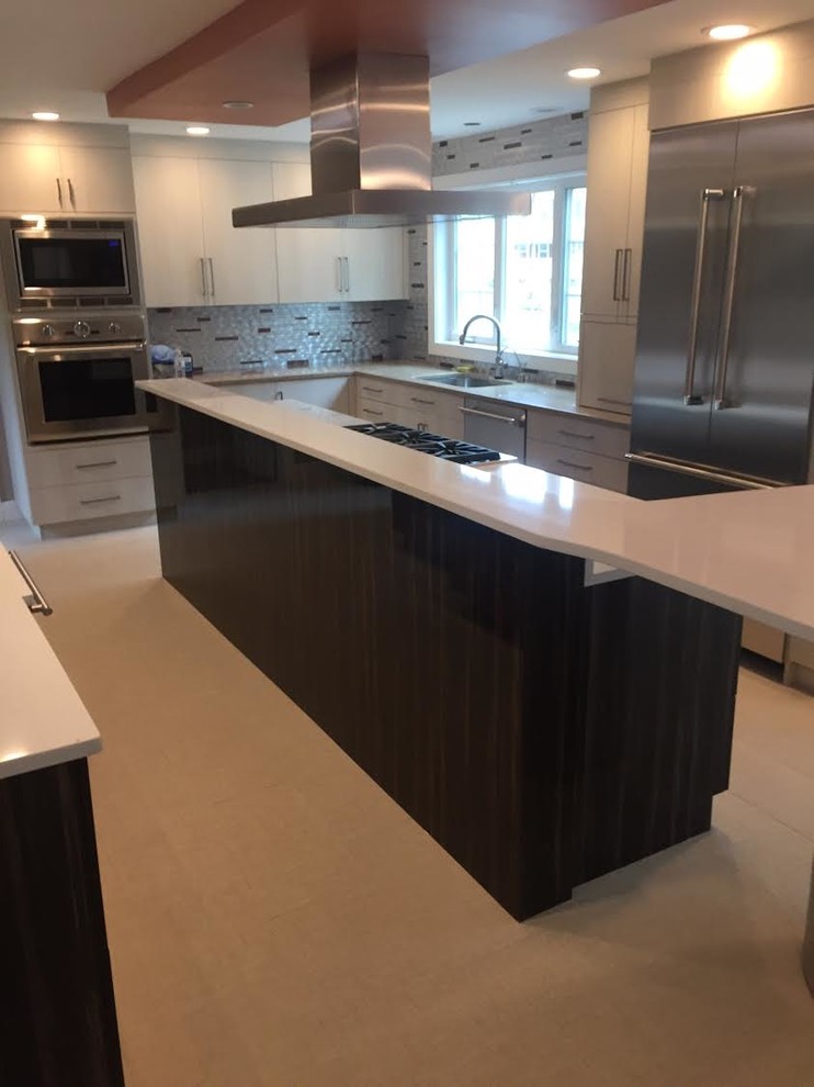 Inspiration for a contemporary kitchen in Boston with flat-panel cabinets, dark wood cabinets, quartzite benchtops, multi-coloured splashback, matchstick tile splashback, stainless steel appliances, travertine floors and with island.